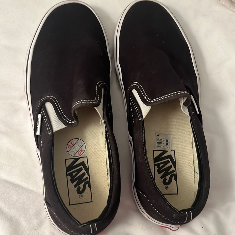 Size 8.5 vans. Black slips on.
